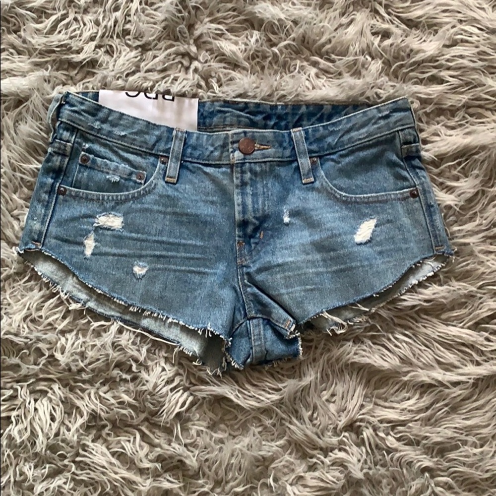 Low rise dolphin cut shorts